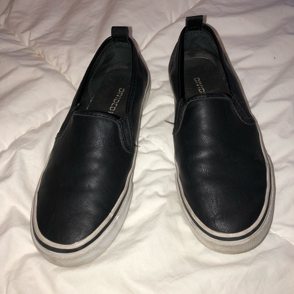 H&M’s Divided black/white leather slip on sneakers